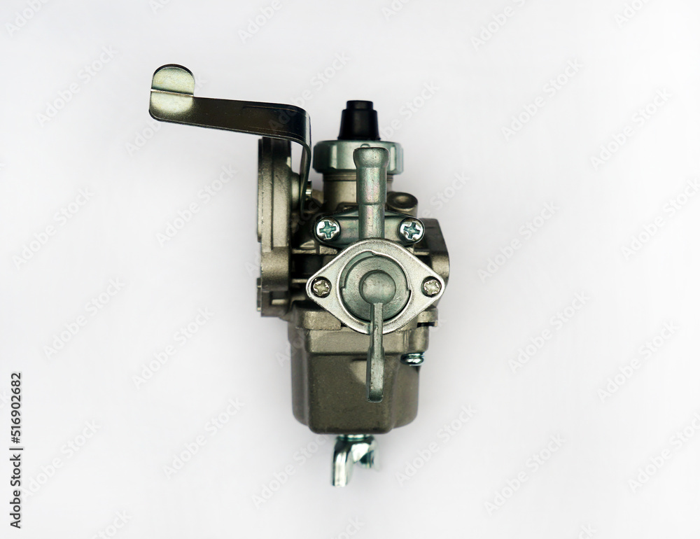 Switch Fuel Gas Tap On Off Oil or oil valve for lawn mower carburetor on white background. A device that mixes air and fuel for internal combustion engines in appropriate air–fuel ratio for combustion Switch Fuel Gas Tap On Off Oil or oil valve for lawn mower carburetor on white background. A device that mixes air and fuel for internal combustion engines in appropriate air–fuel ratio for combustion