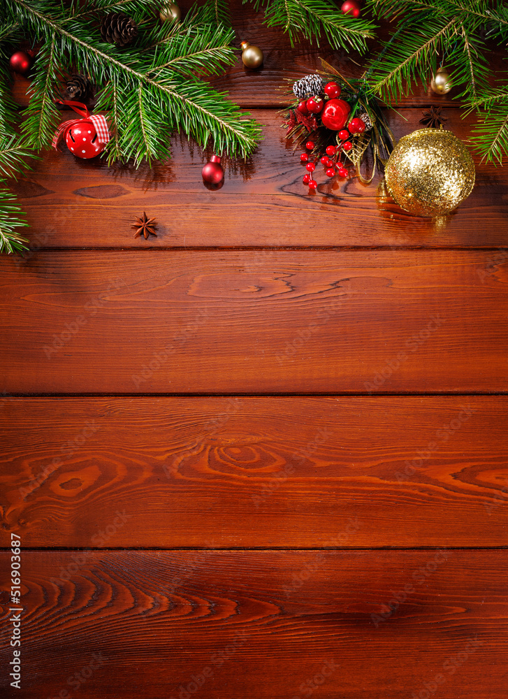 Vertical Christmas background for text from boards with a real wooden green pine tree and Christmas toys. View from above. Vertical Christmas background for text from boards with a real wooden green pine tree and Christmas toys. View from above.
