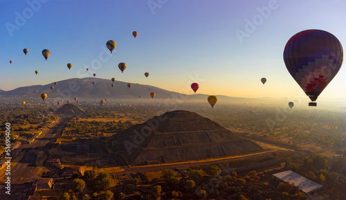 Sunrise on hot air balloon over the Teotihuacan pyramid photo