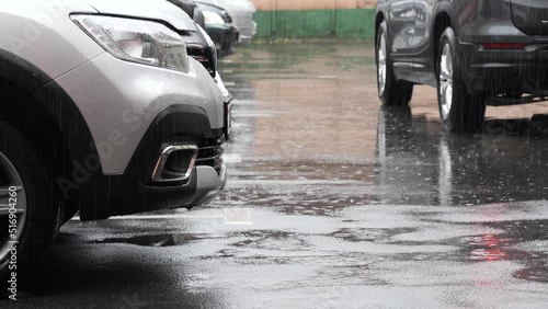 bad weather in the summer it rains the car gets wet photo