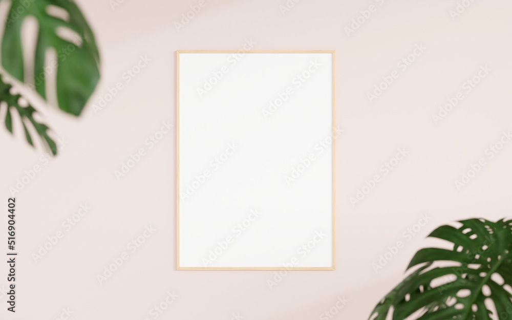 Clean and minimalist front view vertical wooden photo or poster frame mockup hanging on the wall with blurry plant. 3d rendering. Clean and minimalist front view vertical wooden photo or poster frame mockup hanging on the wall with blurry plant. 3d rendering.