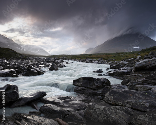 Rapids of Smailajakka river and mountain in Sarek National Park Sweden photo