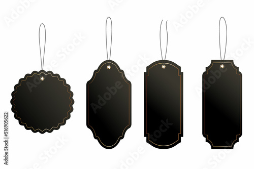 Set of black price or luggage tags of vintage shapes with rope.