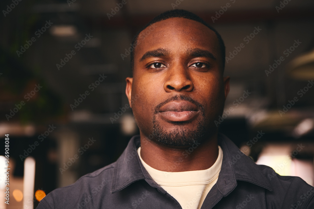 Confident Young Black Male Standing In Office Looking At Camera
