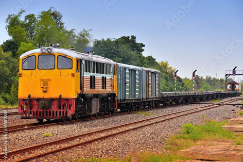 Freight train by diesel locomotive on the railway in Thailand
