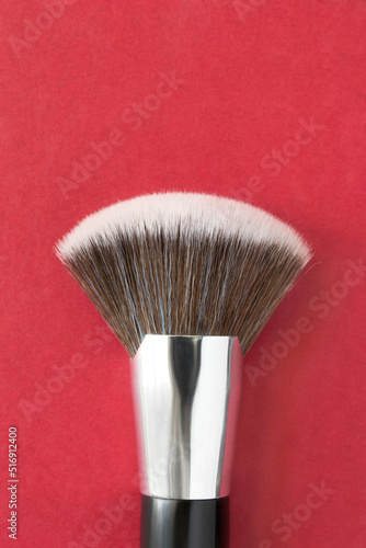 Makeup brush on red