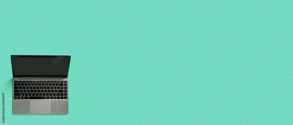 Top view of modern laptop isolated on colored background. Copy space Top view of modern laptop isolated on colored background. Copy space