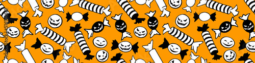 Vector seamless pattern of candy in different wrappers in Halloween style. Trick or treat. Bright texture for holiday design, decoration, wrapping paper