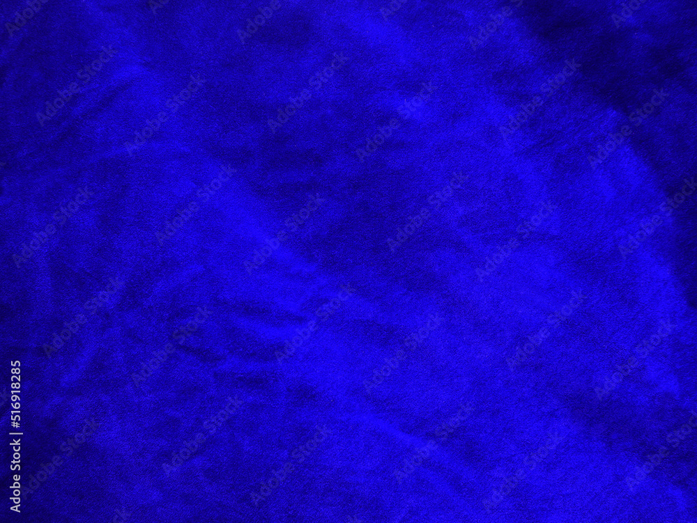 Blue velvet fabric texture used as background. Empty light blue fabric background of soft and smooth textile material. There is space for text..