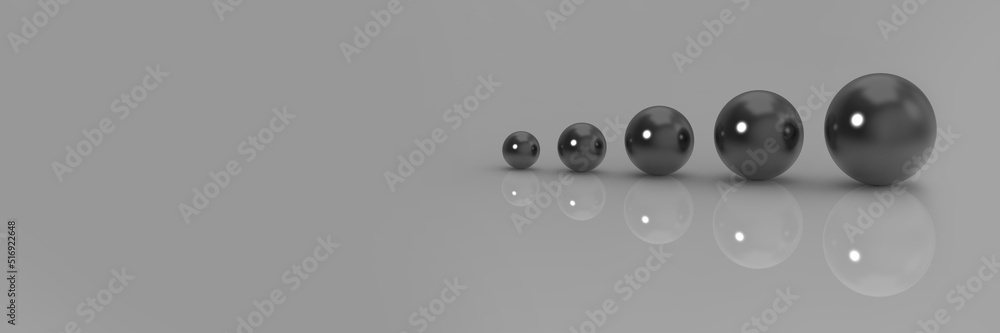 five balls of different sizes on a gray background. the concept of growth in anything. profit increase. Banner for insertion into site. Place for text cope space. 3d image.3d rendering. five balls of different sizes on a gray background. the concept of growth in anything. profit increase. Banner for insertion into site. Place for text cope space. 3d image.3d rendering.