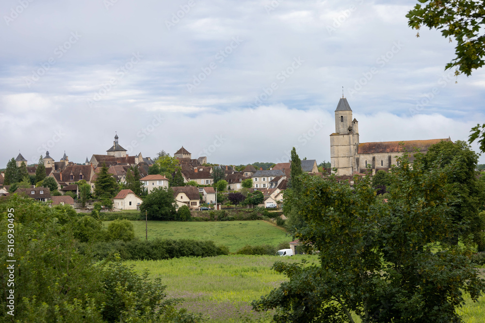 Martel Village in France. Romantic and ancient village seen from a steam train.