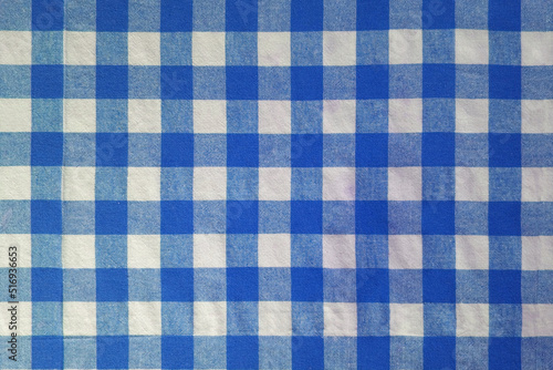 Blue and white classic checkered tablecloth texture