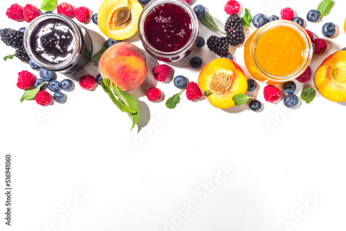 Fototapeta Naklejka Na Ścianę i Meble -  Assortment of berries and fruits jams in jars