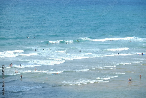 Some people having a bath in the waves of Bidart. The 7th july 2022, France.