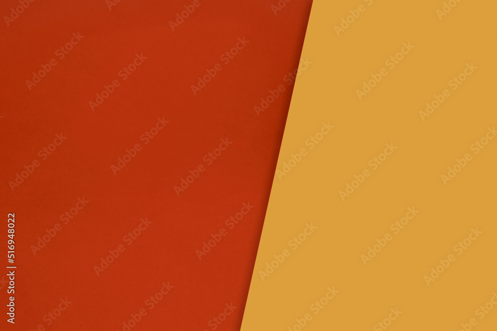 Dark vs light abstract Background with plain subtle smooth  de saturated red yellow orange colours parted into two