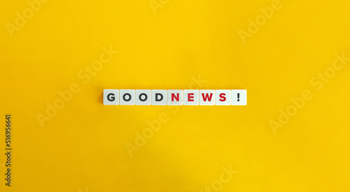 Good News Banner. Text on Block Letter Tiles on Yellow Background. Minimal Aesthetics.
