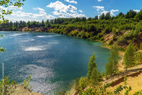 On the shore of the Pugarevsky quarry . Summer landscape. Leningrad region. Vsevolozhsk.