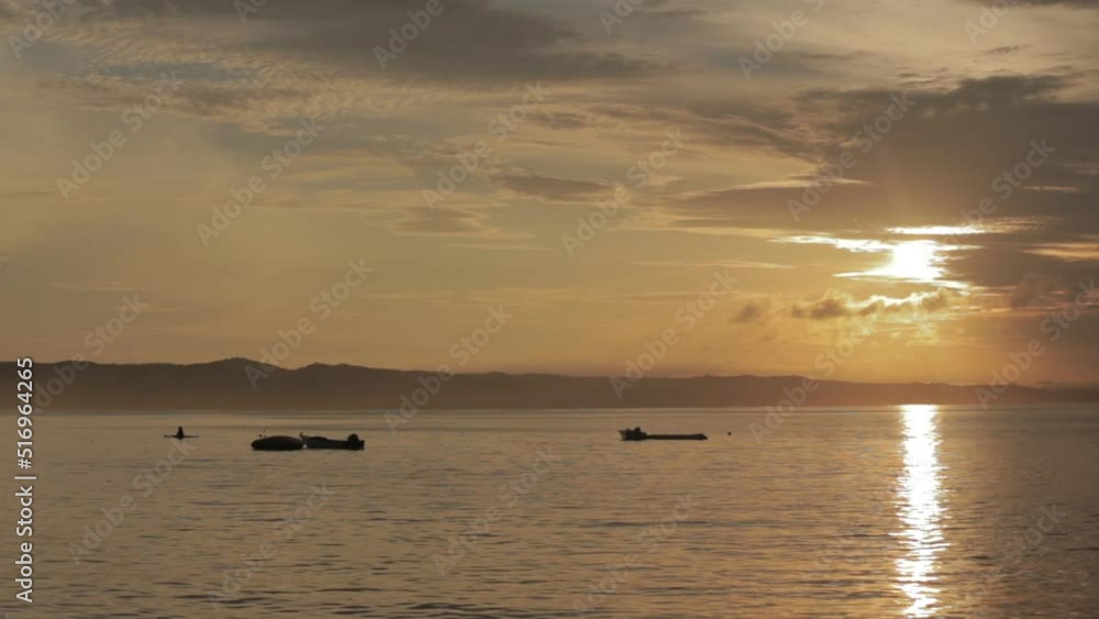 Beautiful Peaceful Sunrise and Silhouette at Pangandaran East Beach, West Java, Indonesia Beautiful Peaceful Sunrise and Silhouette at Pangandaran East Beach, West Java, Indonesia