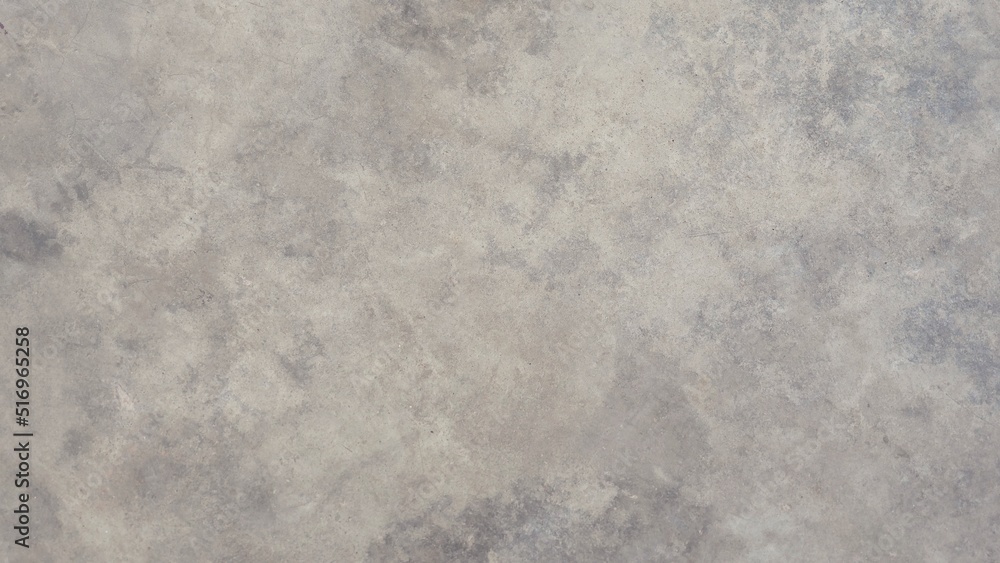 Naklejka premium The old cement wall was weathered, the surface was scratched, the surface was scratched and damaged. For a mysterious retro-conservative background.