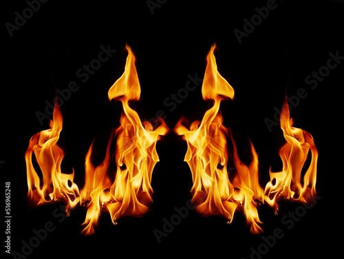 A beautiful flame shaped as imagined. like from hell, showing a dangerous and fiery fervor, black background.