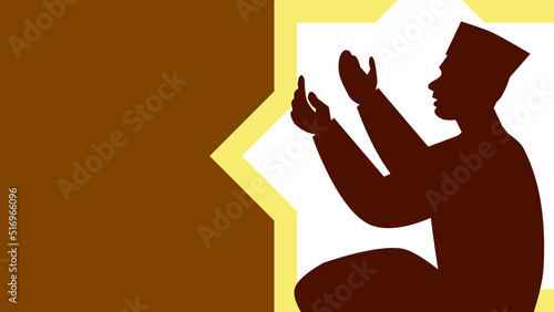 Silhouette of a muslim man raising his hands to pray