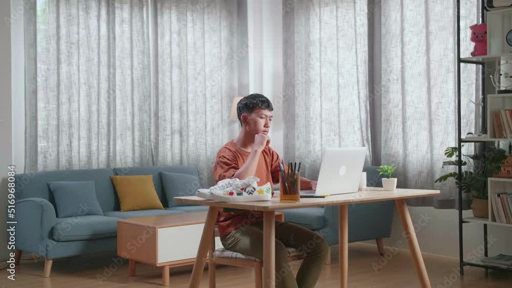 Asian Boy Footwear Designer Thinking Then Raising Index Finger While Working On A Laptop At Home
Asian Boy Footwear Designer Thinking Then Raising Index Finger While Working On A Laptop At Home