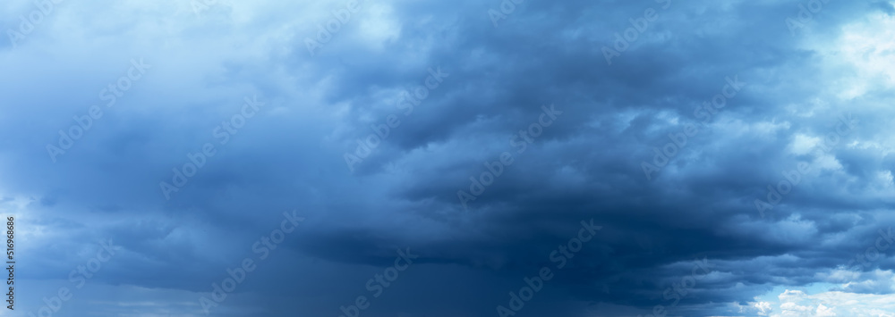 Fototapeta premium Light in the Dark and Dramatic Storm Clouds background