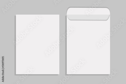 A4 white letter paper DL envelope front view. closed on gray background