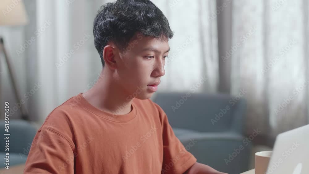 Close Up Of Asian Boy Footwear Designer Stretching After Working On A Laptop At Home
Close Up Of Asian Boy Footwear Designer Stretching After Working On A Laptop At Home