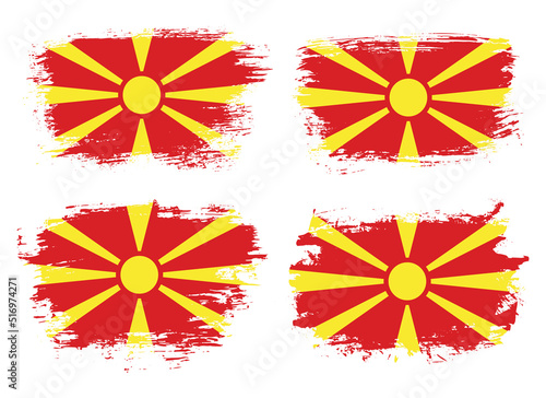 Artistic North Macedonia country brush flag collection. Set of grunge brush flags on a solid background