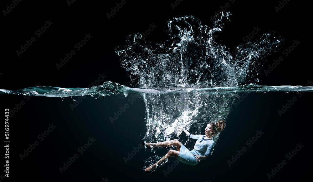 Young businesswoman swimming underwater . Mixed media Young businesswoman swimming underwater . Mixed media