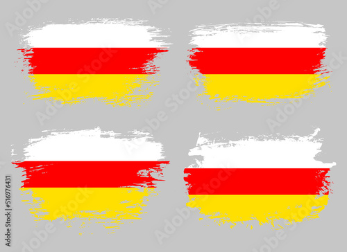 Artistic South Ossetia country brush flag collection. Set of grunge brush flags on a solid background