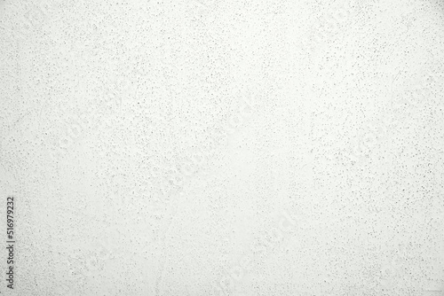 Textured white grunge grainy background.