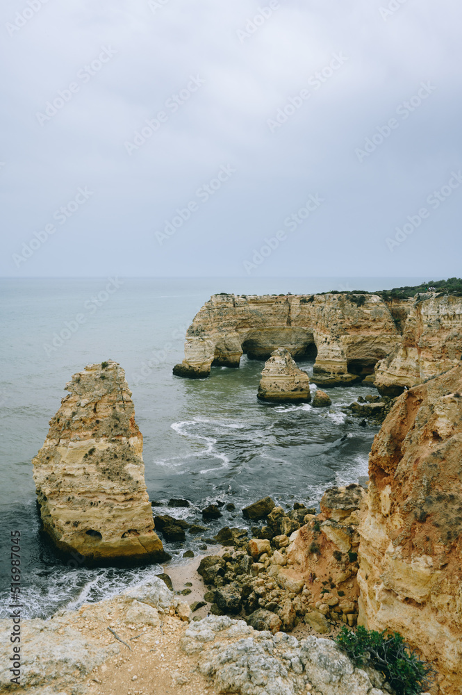 beach and rocks on algarve portugal
