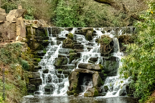 Ornamental cascade waterfall in Virginia Water, Surrey, United Kingdom