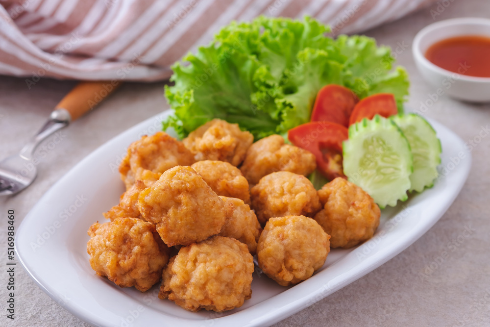 Deep fried shrimp ball and vegetable on plate Deep fried shrimp ball and vegetable on plate