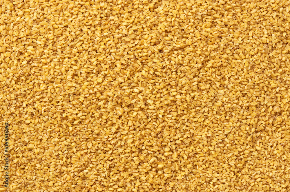 close-up texture of raw bulgur top view. close-up texture of raw bulgur top view.