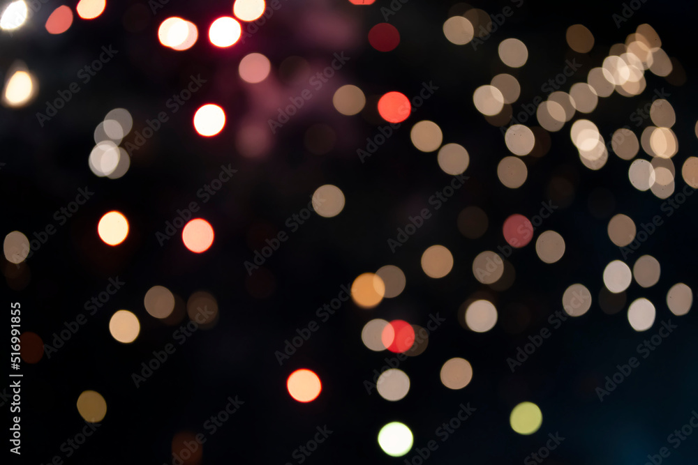 On a black background bokeh from explosions of colorful fireworks. On a black background bokeh from explosions of colorful fireworks.
