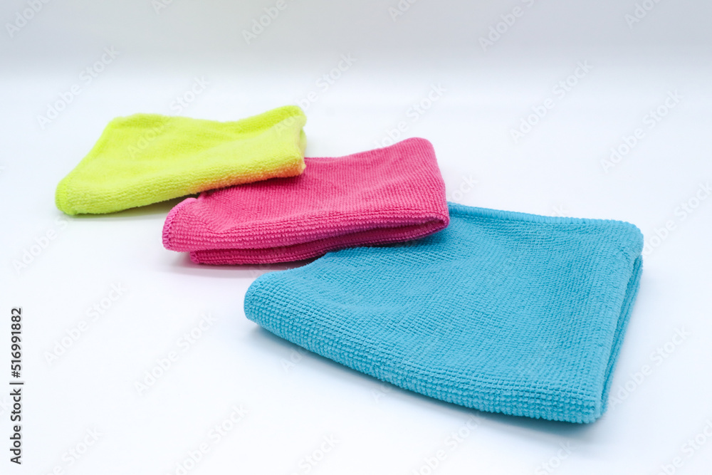 kitchen rag of different colors on white background