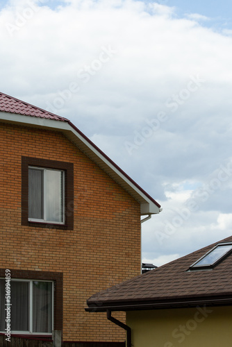 new houses, roof with window, two-storey house © Anna