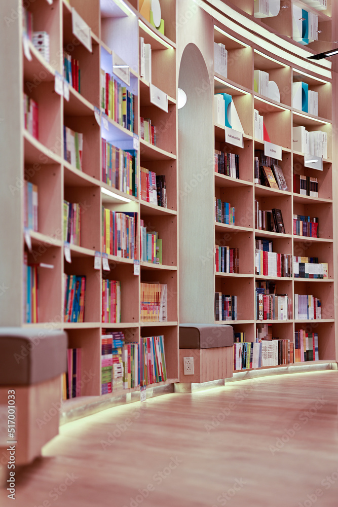 Bookshelves in bookstore for background in education concept.