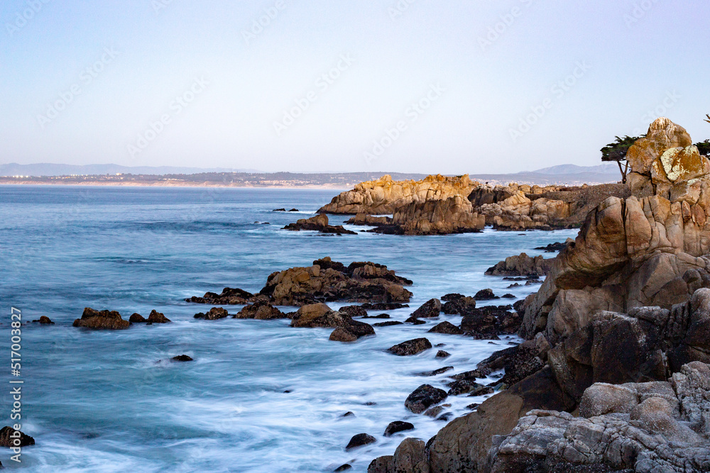 Pacific ocean sunset with the coast