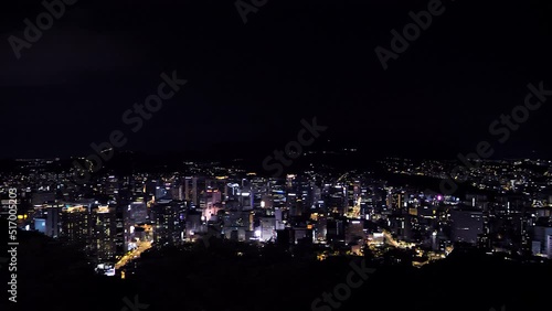 Wallpaper Mural Aerial panning shot showing lighting city skyline of Seoul Town at night,4K - View from Seoul Tower during dark midnight Torontodigital.ca