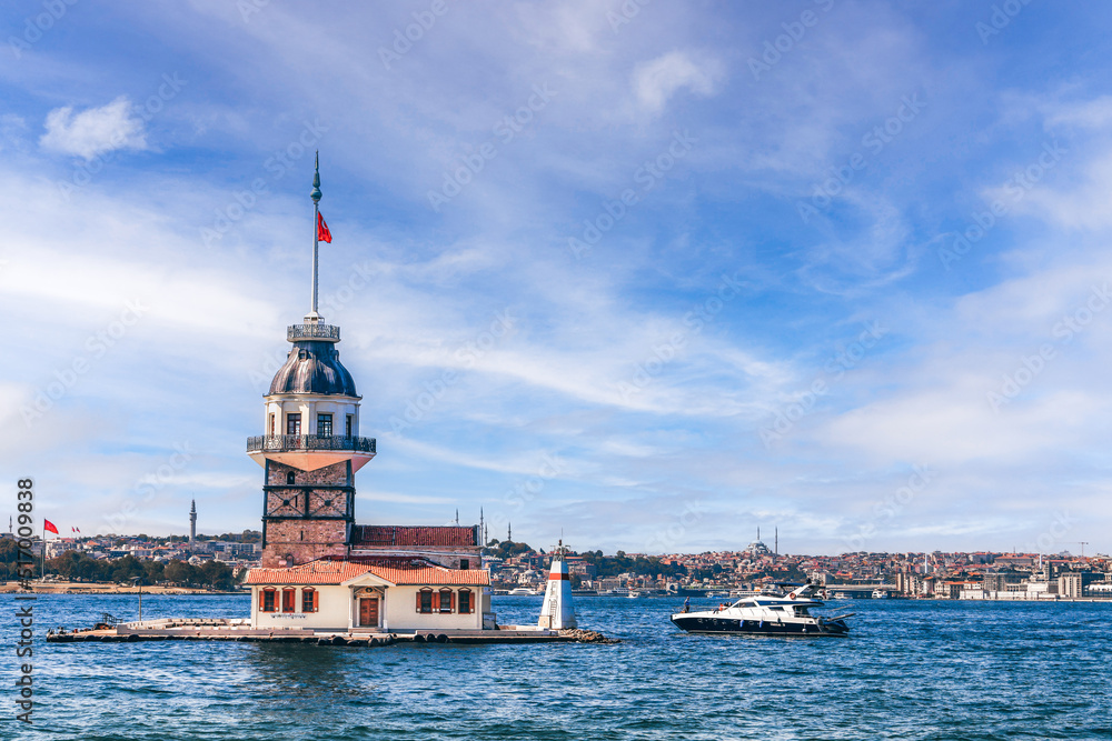 Bosphorus with famous Maiden's Tower (Kiz Kulesi) also known as Leander's Tower, symbol of Istanbul, Turkey. Scenic travel background for wallpaper or guide book Bosphorus with famous Maiden's Tower (Kiz Kulesi) also known as Leander's Tower, symbol of Istanbul, Turkey. Scenic travel background for wallpaper or guide book