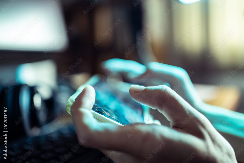 Obraz premium Playing game on mobile phone