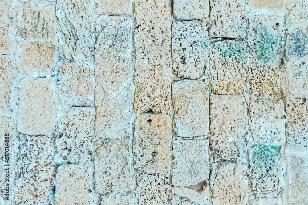 Fototapeta premium Horizontal Photo of Old Blue Brick or Stone Wall. Texture of an Aged Rough Brickwall