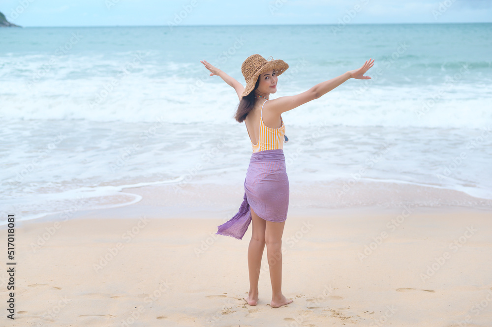 Young Beautiful woman in Bikini enjoying and relaxing on the beach, Summer, vacation, holidays, Lifestyles concept. Young Beautiful woman in Bikini enjoying and relaxing on the beach, Summer, vacation, holidays, Lifestyles concept.