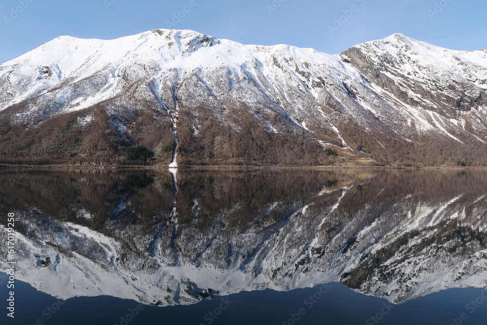 Mountain reflection in the fjord in Norway