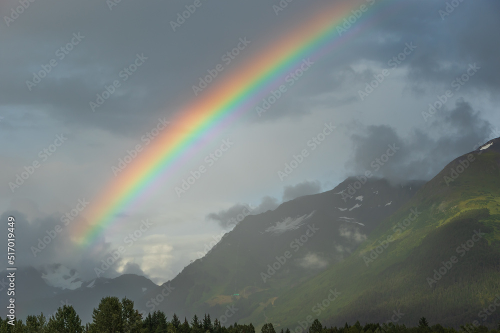 rainbow over the mountains in Alaska rainbow over the mountains in Alaska