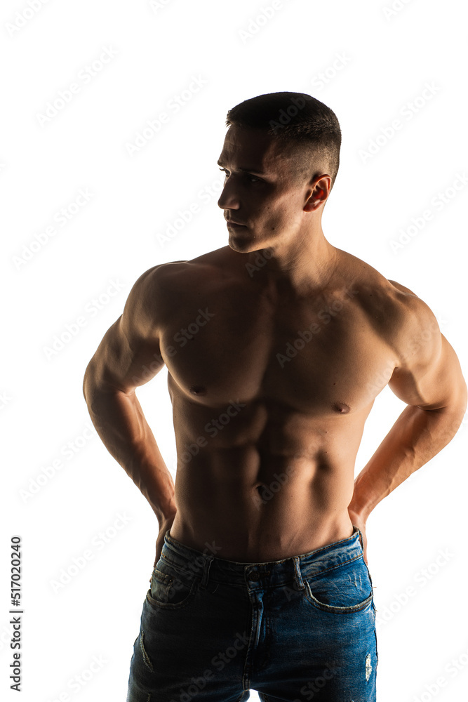 Posing and holding his posture in studio Posing and holding his posture in studio